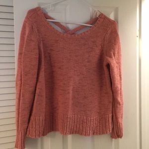 Pink sweater with cross cross back
